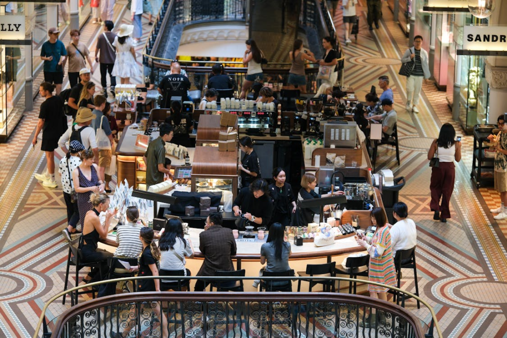 Bustling coffee shop to illustrate modern mall culture.