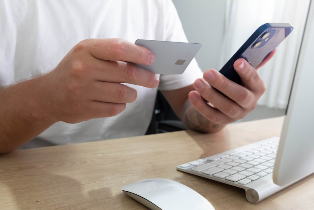 Internet trends that became permanent shown through online shopping with a phone and credit card.